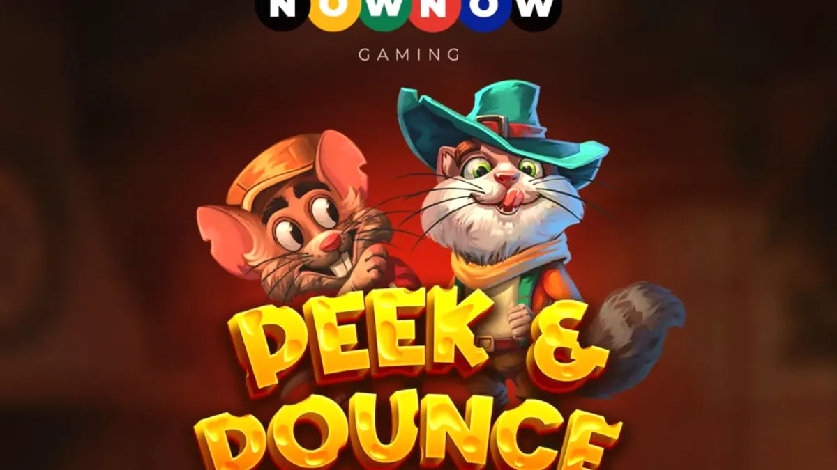 Visual gaya kartun yang ceria dari slot Peek & Pounce dengan kucing dan tikus di dapur